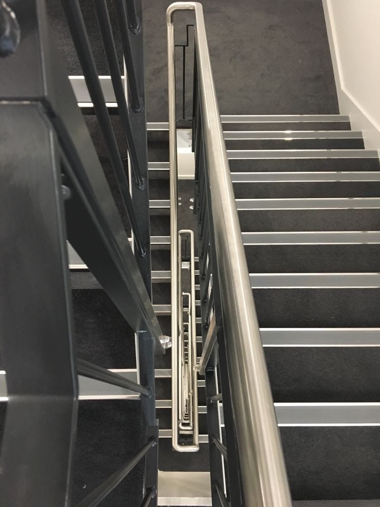 Aluminium Stair Nosing with Smooth Textured Infill on a commercial staircase