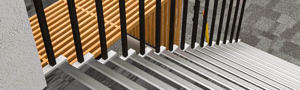 Aluminium Stair Nosings on a desk staircase in an office setting. 