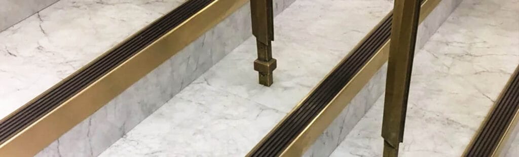 BN55 Brass Stair Nosings with an Antique Bronze insert designed for and installed at Selfridges. 